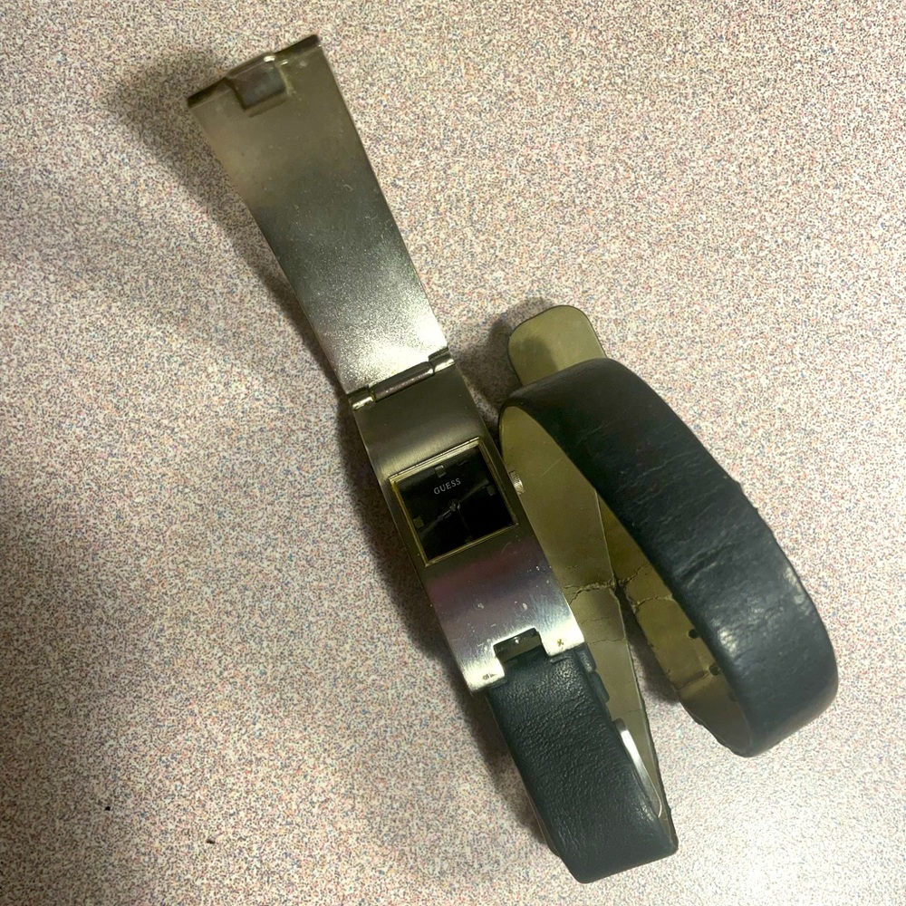Guess watch with black leather double wrap around band.